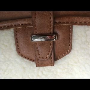 Mid size nine West purse.